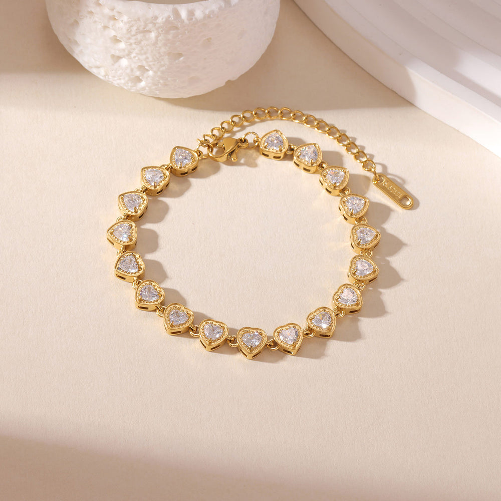 Bratara tennis otel placat cu aur PVD inimioare - Finna Deloria