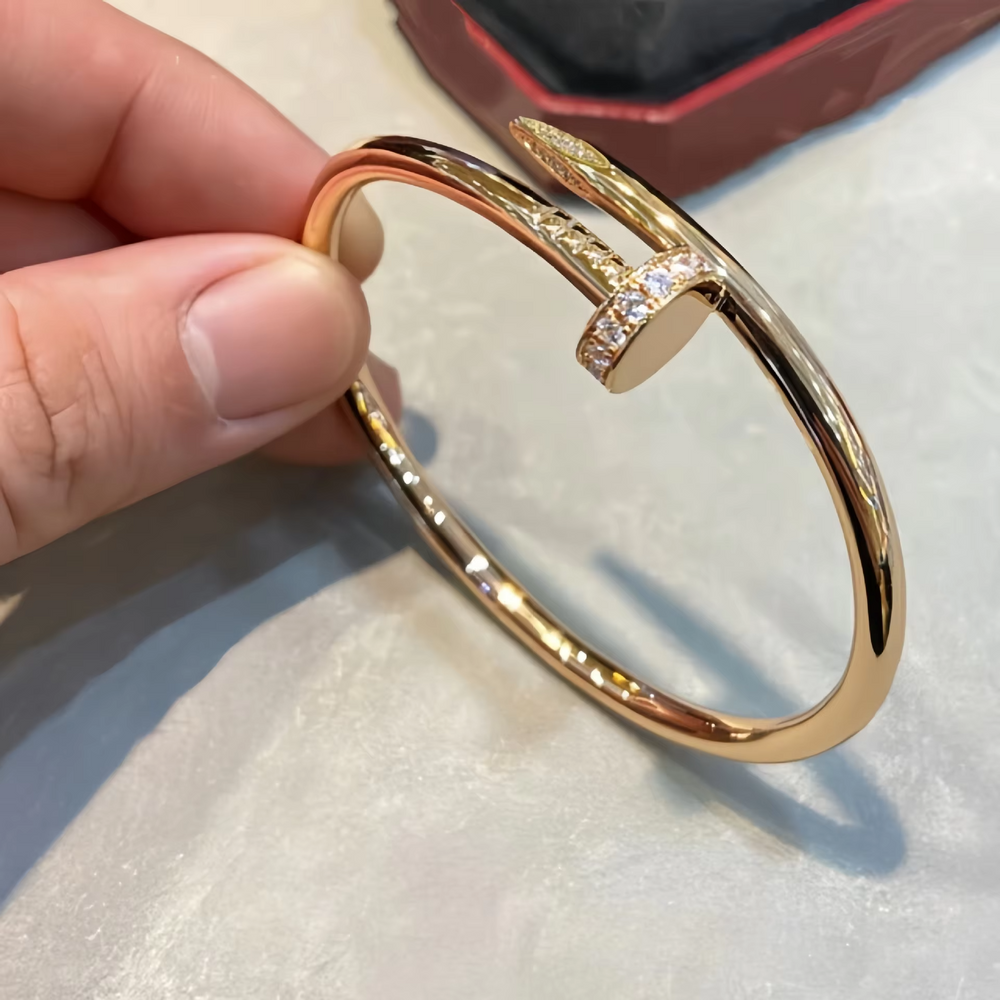 bratara cui cu pietricele , placata cu aur deloria